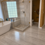 soaking tub and walk in glass shower